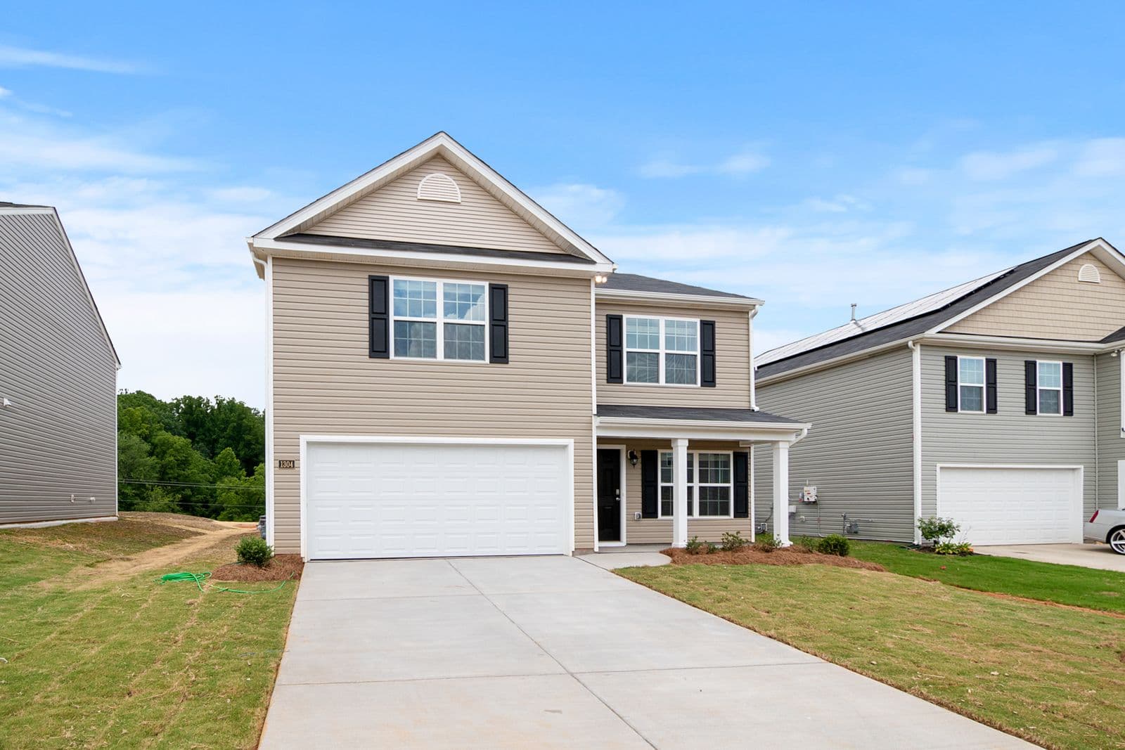 Two-story home with freshly soft washed siding